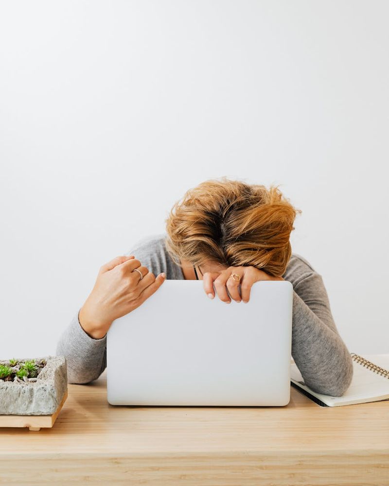 Person working at a desk taking a mindful break.